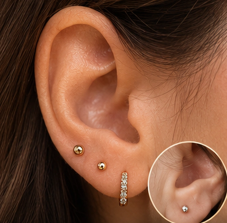 Referencia visual de perforación upper lobe en la oreja
